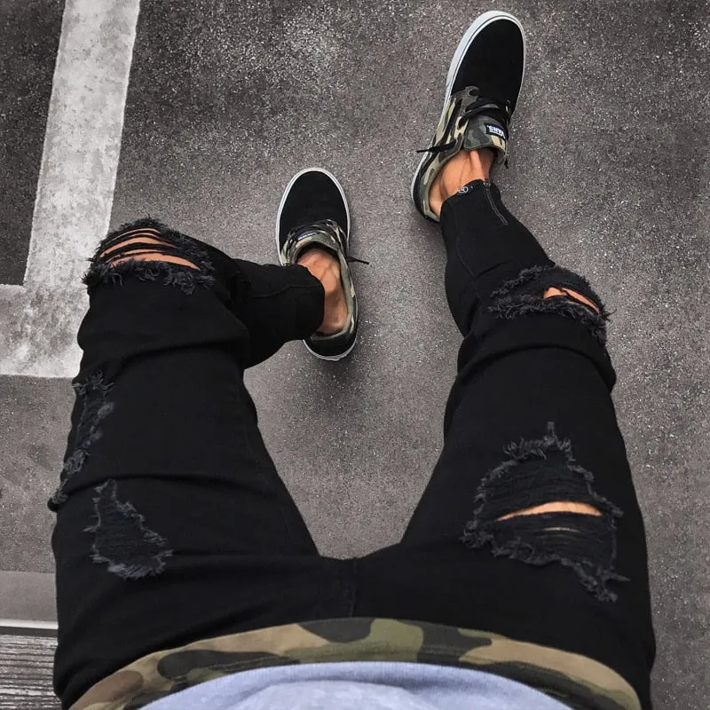 Distressed IVBlack Skinny Jeans